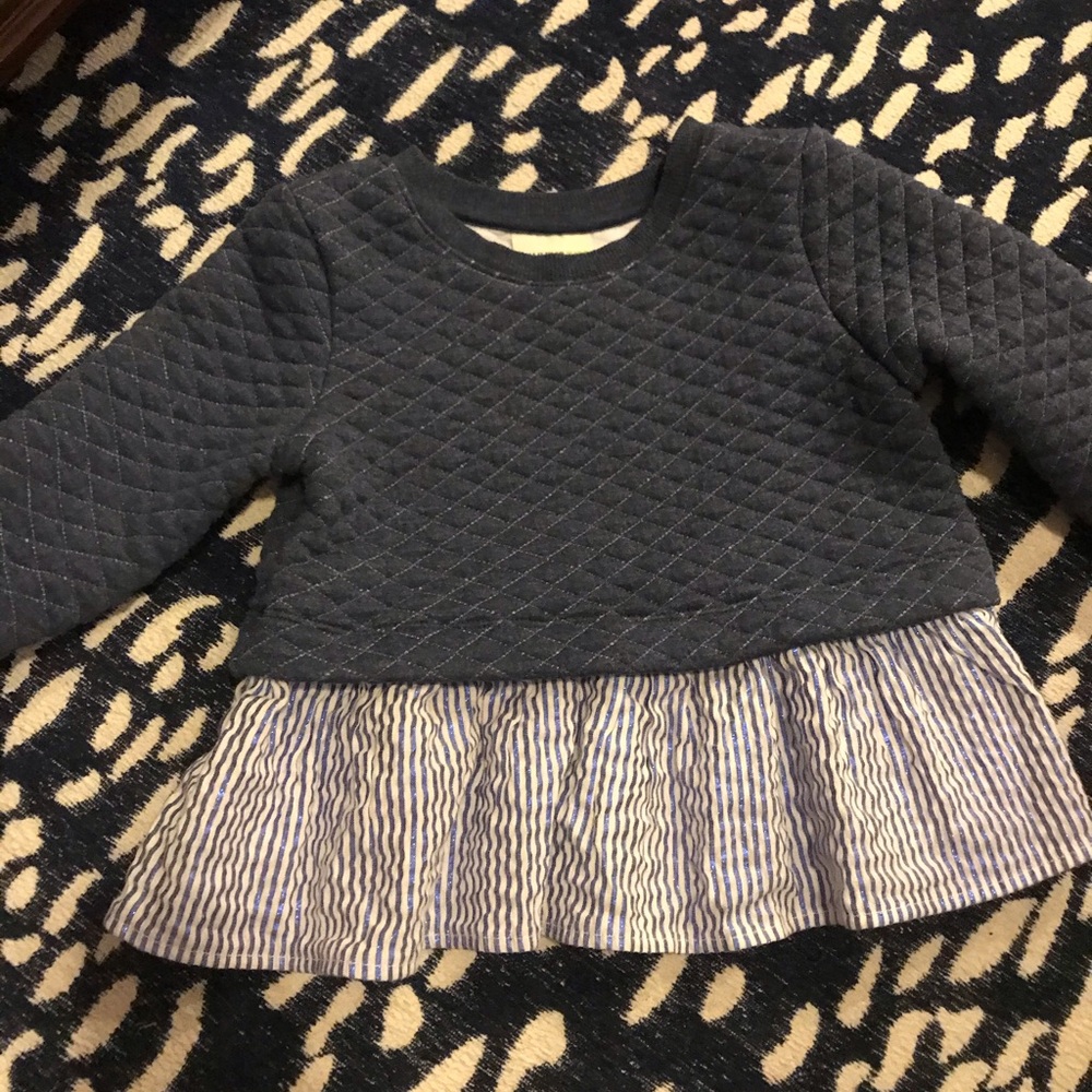 Navy sweatshirt with blue shimmer strip bottom ruffle